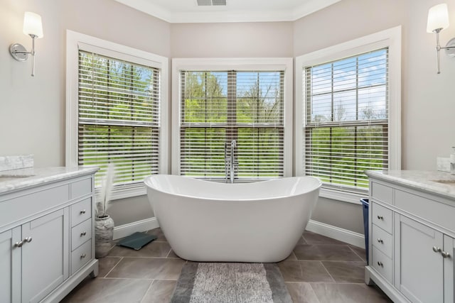 600 Avawam Dr, Richmond, KY 40475 - full bathroom featuring visible vents, baseboards, tile patterned floors, vanity, and a freestanding bath