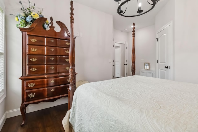 600 Avawam Dr, Richmond, KY 40475 - bedroom featuring baseboards, wood finished floors, and a notable chandelier