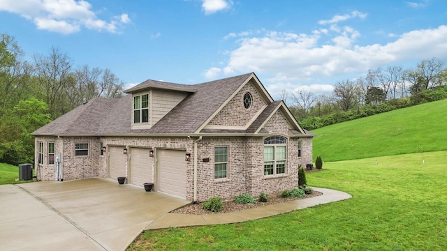600 Avawam Dr, Richmond, KY 40475 - view of property exterior featuring central air condition unit, a shingled roof, a lawn, driveway, and brick siding