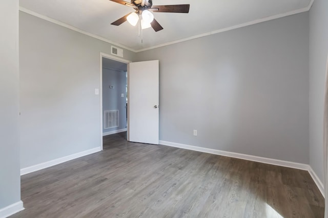 679 Mclain Rd, Springfield, KY 40069 - spare room with wood finished floors, visible vents, and a ceiling fan