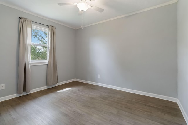 679 Mclain Rd, Springfield, KY 40069 - empty room featuring baseboards, a ceiling fan, dark wood-style floors, and ornamental molding