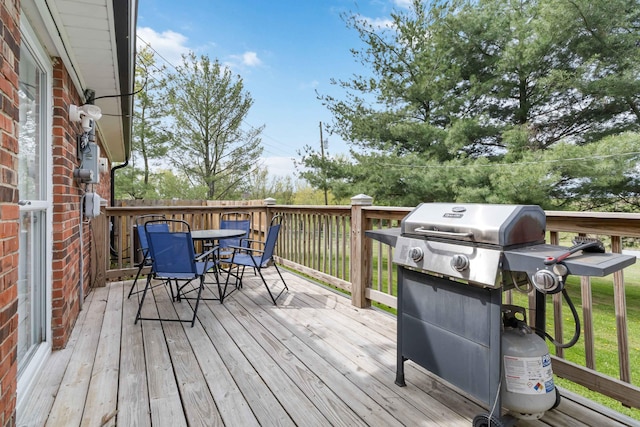 679 Mclain Rd, Springfield, KY 40069 - wooden terrace featuring a grill and outdoor dining space