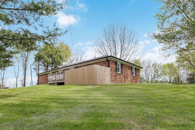 679 Mclain Rd, Springfield, KY 40069 - view of side of home featuring brick siding and a yard