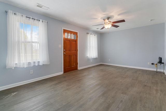 679 Mclain Rd, Springfield, KY 40069 - foyer entrance featuring visible vents, a ceiling fan, dark wood-style floors, and a healthy amount of sunlight