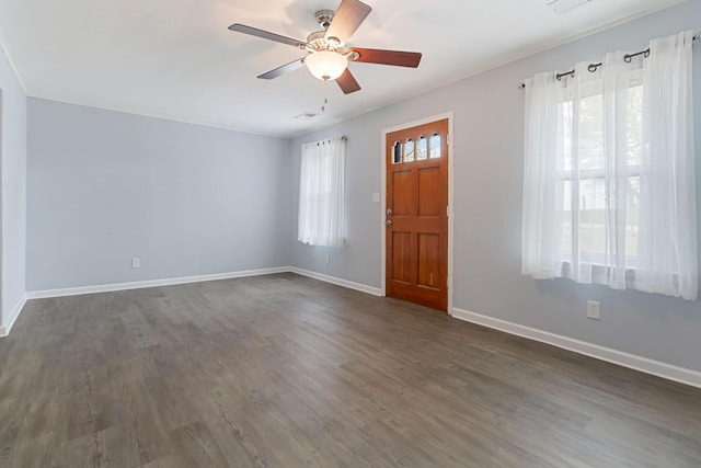 679 Mclain Rd, Springfield, KY 40069 - foyer entrance with dark wood-style flooring, baseboards, ceiling fan, and visible vents