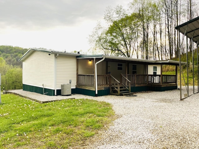 501 Smith Rd, Manchester, KY 40962 - back of property with a yard and cooling unit
