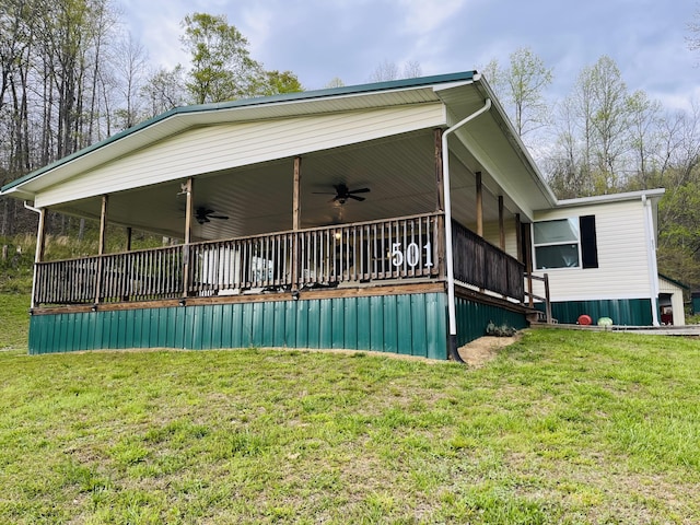 501 Smith Rd, Manchester, KY 40962 - back of property with a porch, ceiling fan, and a yard