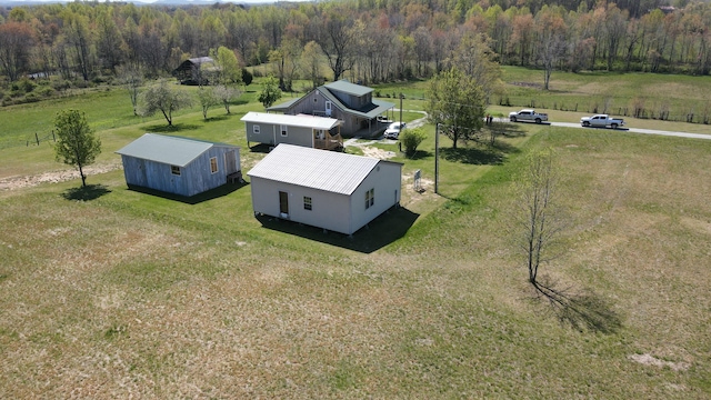 drone / aerial view with a rural view and a wooded view