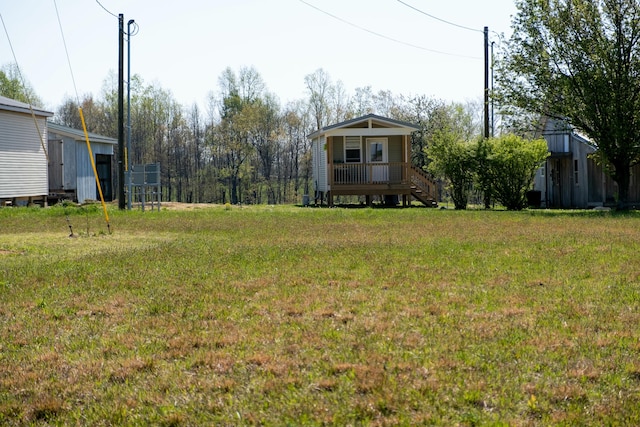 view of yard featuring stairs