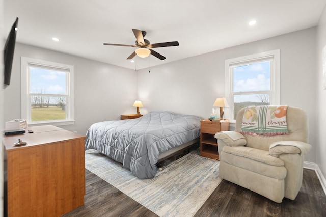 bedroom with ceiling fan, dark wood-style floors, and recessed lighting