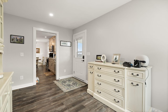 entrance foyer with baseboards, dark wood-style floors, and recessed lighting