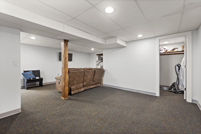 finished below grade area featuring recessed lighting, carpet floors, and a paneled ceiling