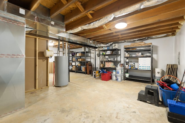 unfinished basement featuring water heater