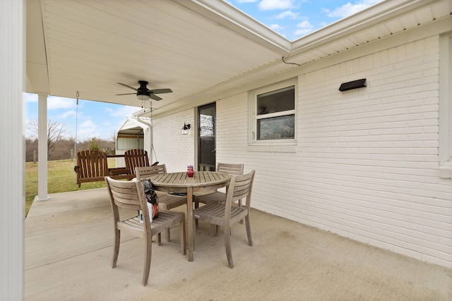 view of patio / terrace featuring outdoor dining area and ceiling fan