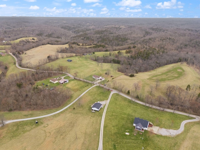 drone / aerial view with a forest view and a rural view