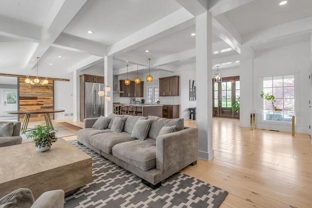813 Westchester Dr, Lexington, KY 40502 - living area with a chandelier, light wood-type flooring, beamed ceiling, baseboards, and recessed lighting