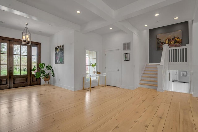 813 Westchester Dr, Lexington, KY 40502 - foyer featuring french doors, a chandelier, light wood-style floors, and visible vents