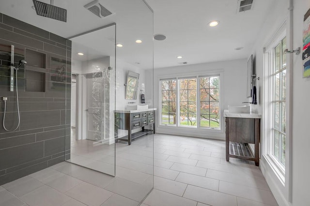 813 Westchester Dr, Lexington, KY 40502 - bathroom with recessed lighting, walk in shower, visible vents, and vanity