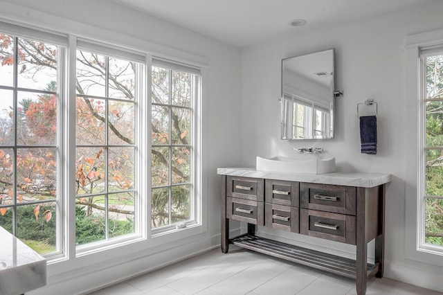 813 Westchester Dr, Lexington, KY 40502 - bathroom with tile patterned floors and vanity