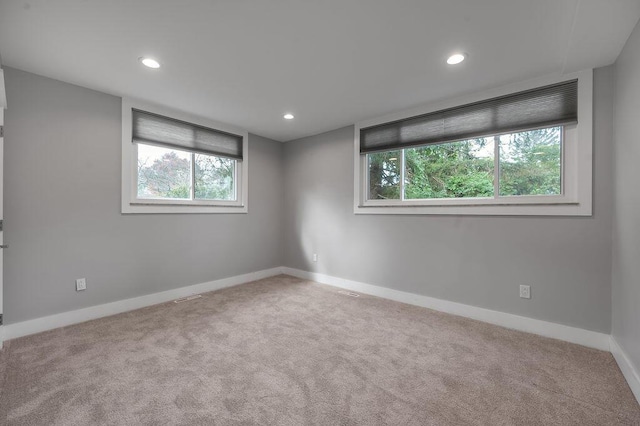 813 Westchester Dr, Lexington, KY 40502 - carpeted spare room with baseboards and recessed lighting