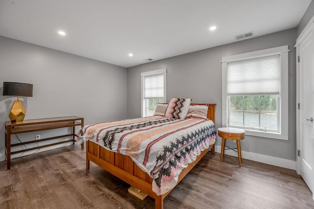 813 Westchester Dr, Lexington, KY 40502 - bedroom featuring baseboards, wood finished floors, visible vents, and recessed lighting