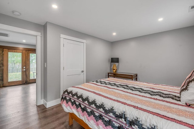 813 Westchester Dr, Lexington, KY 40502 - bedroom with recessed lighting, wood finished floors, visible vents, and baseboards