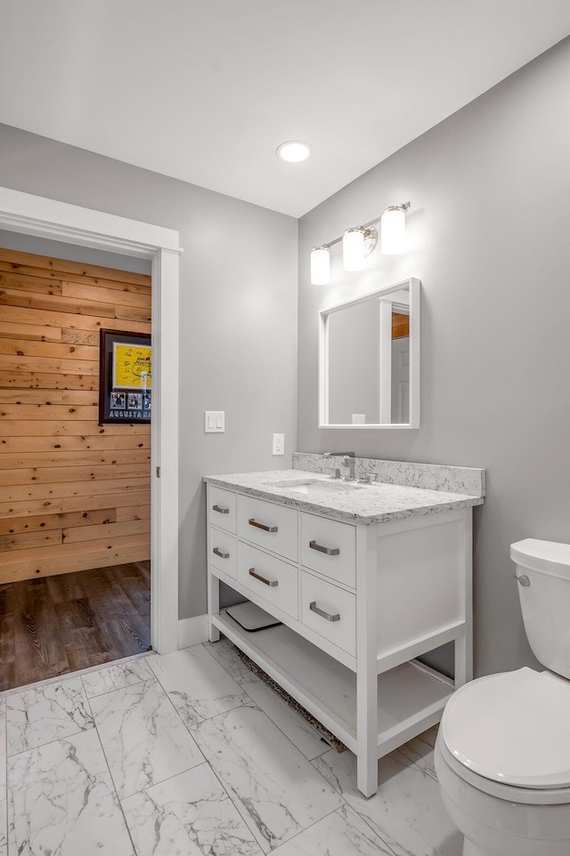 813 Westchester Dr, Lexington, KY 40502 - bathroom with recessed lighting, marble finish floor, vanity, and toilet