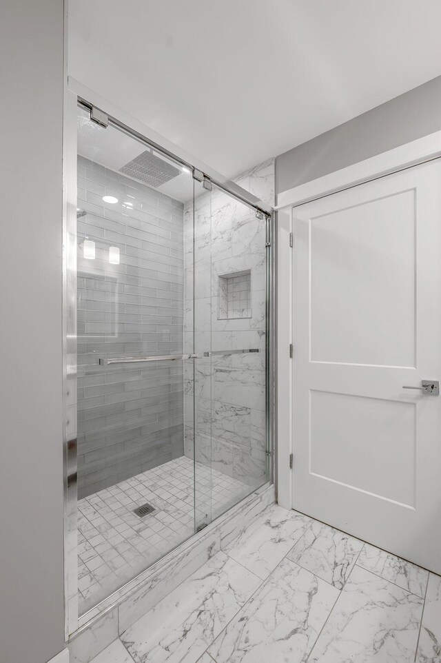 813 Westchester Dr, Lexington, KY 40502 - bathroom featuring marble finish floor and a stall shower