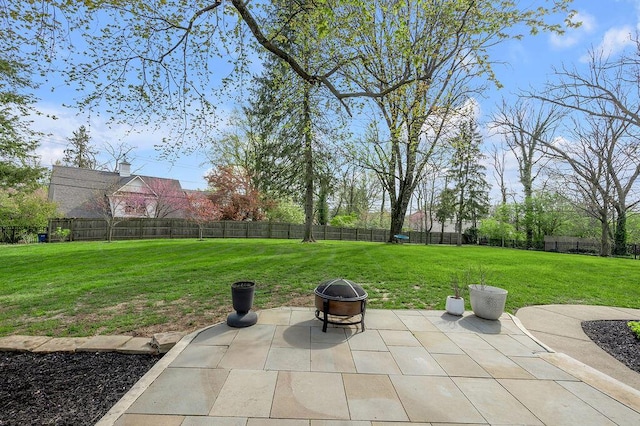 813 Westchester Dr, Lexington, KY 40502 - view of patio featuring a fenced backyard and an outdoor fire pit