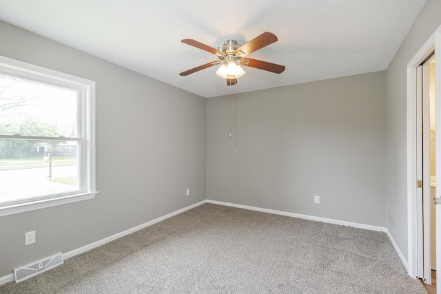 3241 Bowie Dr, Lexington, KY 40517 - unfurnished room with baseboards, a ceiling fan, carpet flooring, and visible vents