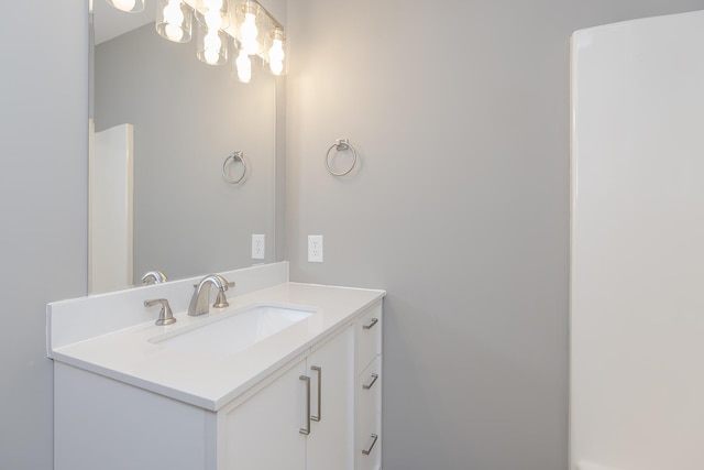 3241 Bowie Dr, Lexington, KY 40517 - bathroom featuring vanity and a chandelier