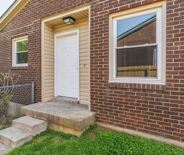 3241 Bowie Dr, Lexington, KY 40517 - view of exterior entry with fence and brick siding