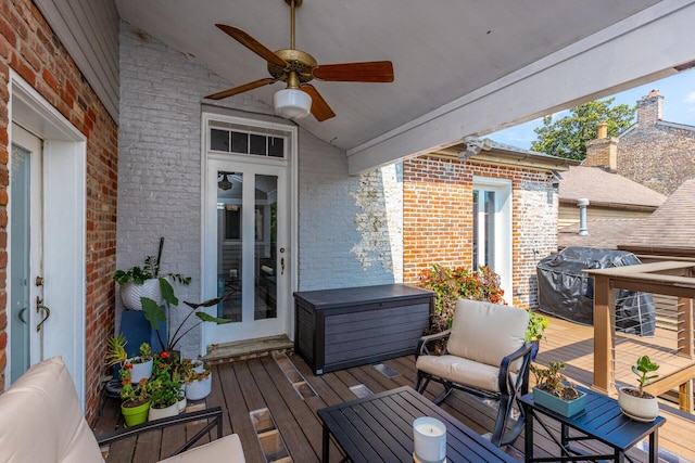 wooden deck with a grill, french doors, and ceiling fan