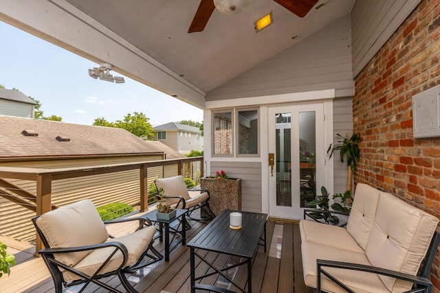 exterior space featuring an outdoor living space, a ceiling fan, and a deck