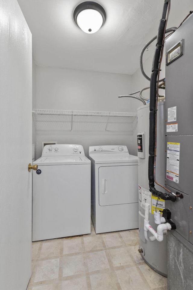 1081 S Broadway Unit 104, Lexington, KY 40504 - laundry room featuring washing machine and clothes dryer and laundry area