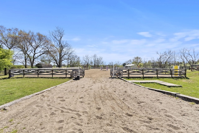 exterior space featuring fence and an enclosed area