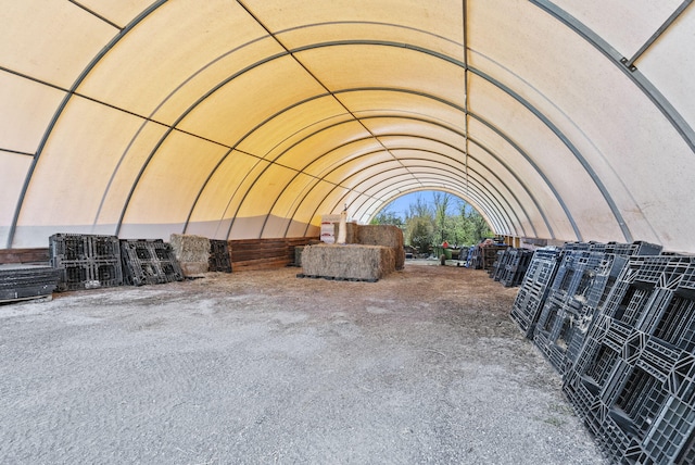miscellaneous room with carpet and vaulted ceiling