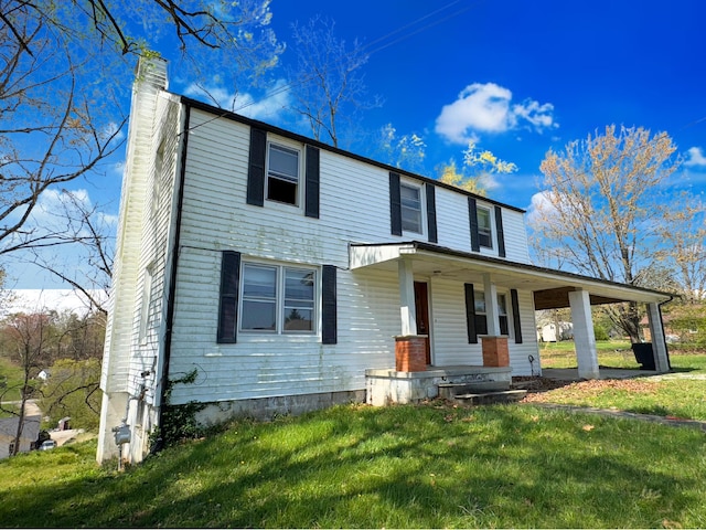 1312 Roosevelt St, Corbin, KY 40701 - view of front of property featuring a porch, a chimney, and a front lawn