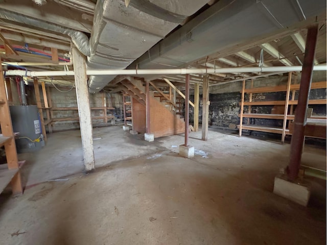 1312 Roosevelt St, Corbin, KY 40701 - unfinished basement with water heater and stairs