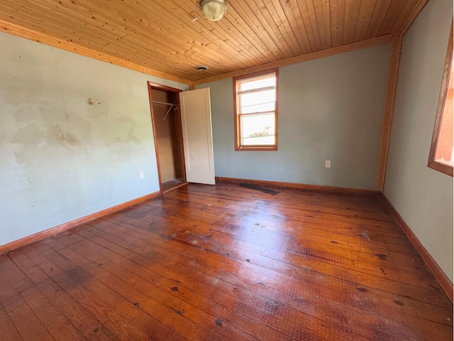 1312 Roosevelt St, Corbin, KY 40701 - unfurnished bedroom with a closet, wood ceiling, baseboards, and dark wood-style floors