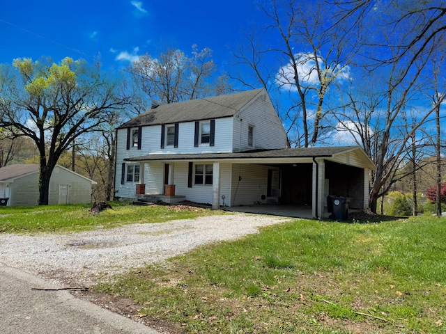 1312 Roosevelt St, Corbin, KY 40701 - farmhouse-style home with roof with shingles, covered porch, a front lawn, a carport, and driveway