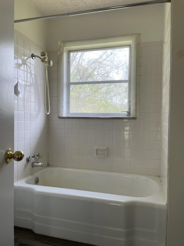 full bath with bathtub / shower combination