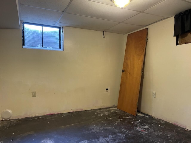 below grade area featuring a paneled ceiling