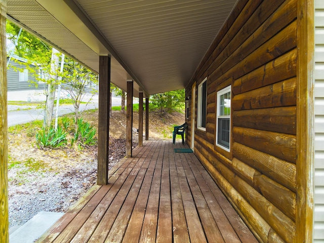 641 Webster Spradlin Rd, Monticello, KY 42633 - wooden deck featuring a porch
