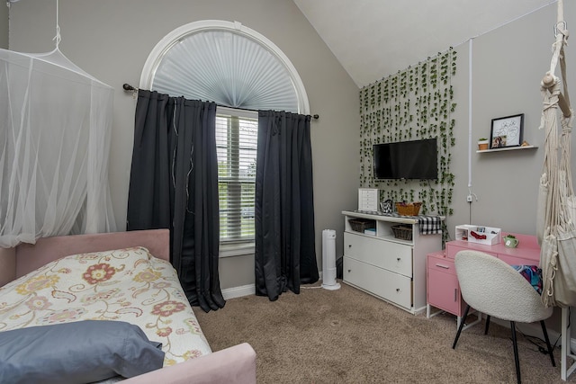 bedroom with carpet flooring, vaulted ceiling, and baseboards