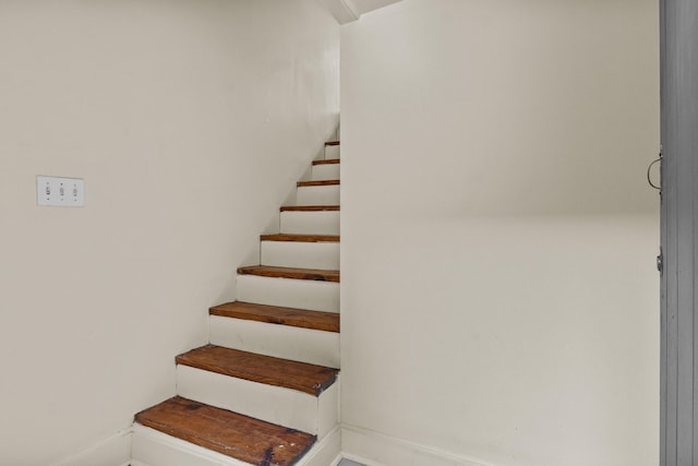 stairway with baseboards