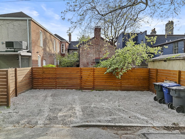 view of patio / terrace featuring fence and central air condition unit