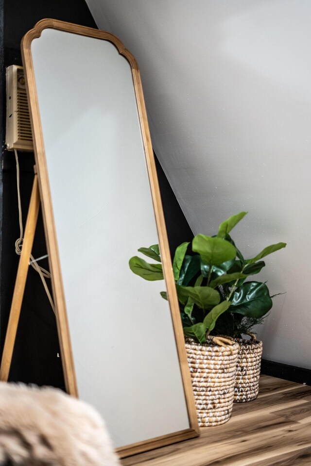 details featuring a wall mounted air conditioner