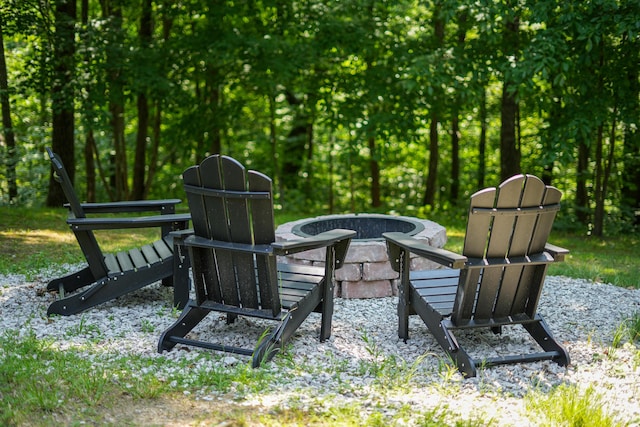 exterior space with an outdoor fire pit