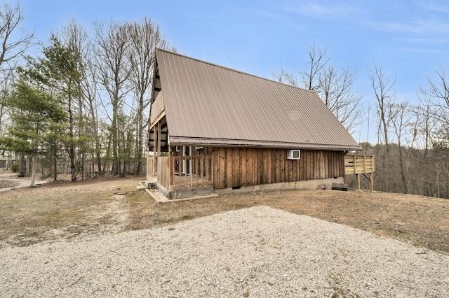 view of home's exterior featuring metal roof